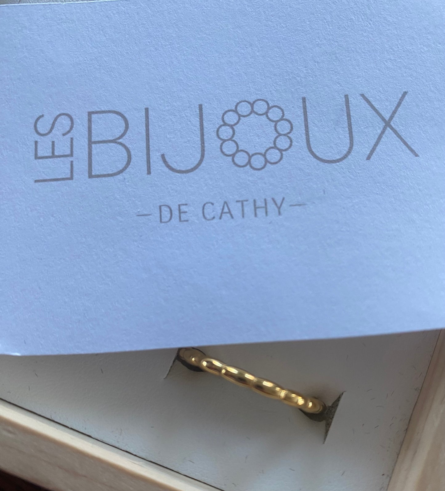 Bague or avec lignes
